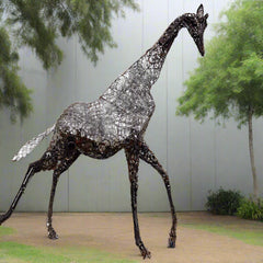 Life Size Giraffe Sculpture with garden background