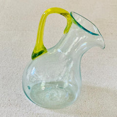 Blown glass slanted jug with yellow handle